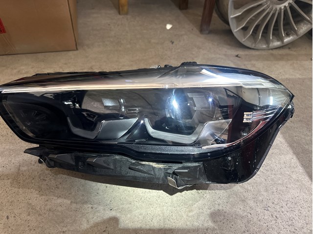 Фара ліва 63117933337 BMW