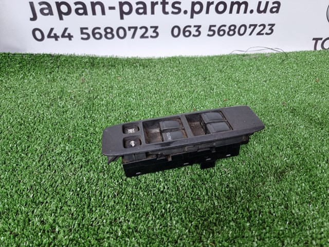 Кнопки переднього лівого склопід'ємника 25401AV640 NISSAN