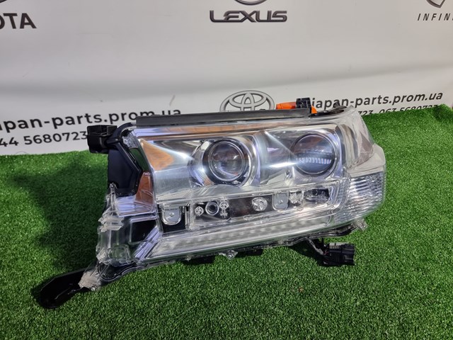Фара ліва передня 8110660K12 TOYOTA
