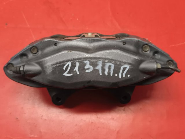 Супорт гальмівний, передній, лівий 102762100A TESLA