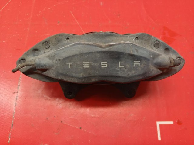 Супорт гальмівний, передній, правий 104264000F TESLA