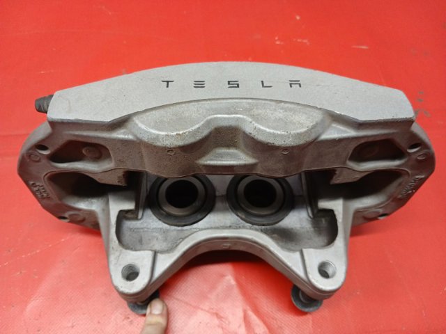 Супорт гальмівний, передній, лівий 104462100E TESLA