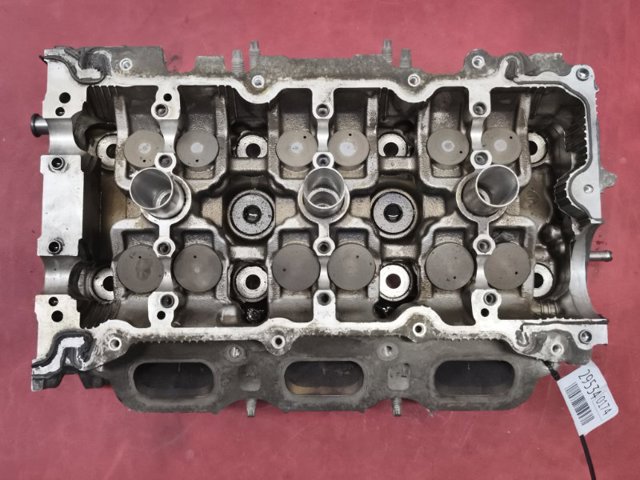 Головка блока циліндрів (ГБЦ), права 110404HK0E NISSAN
