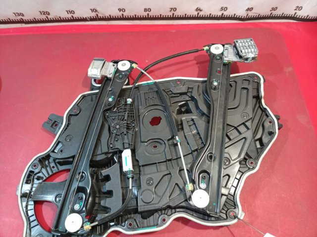 Механізм стеклопідйомника дверей передніх, лівих 152680000B TESLA