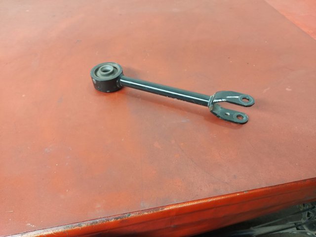 Тяга поздовжня задньої підвіски 551106RR0B NISSAN