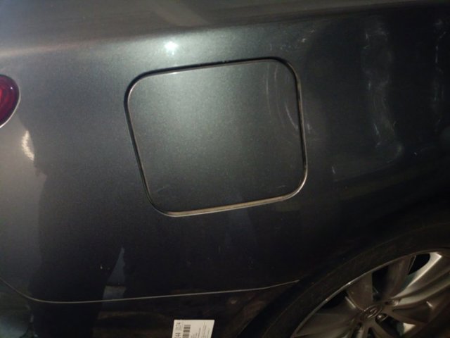 Лючок (дверцята) бензобака 788304GA2B NISSAN