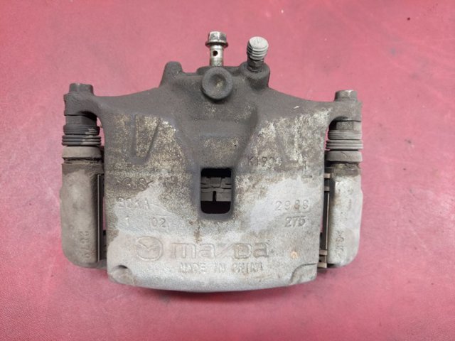 Супорт гальмівний, передній, лівий BCYA3399ZB MAZDA