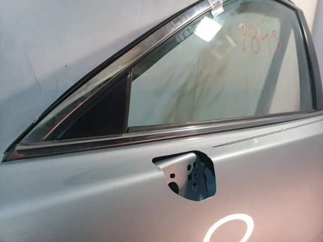 Молдинг опускного скла нижній, двері передньої, лівої TK4850650 MAZDA