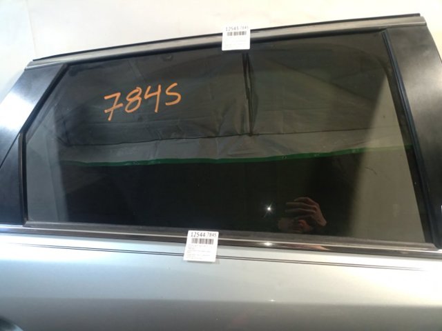 Скло задніх дверей, правих TK4872510A MAZDA