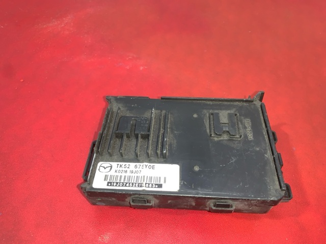 Блок управління комфорту TK52675Y0E MAZDA