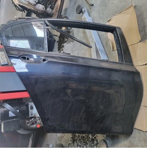 Двері задні в зборі 41007203982 BMW