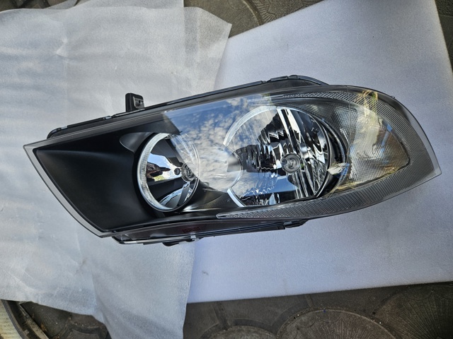 Фара правая 6942722 BMW