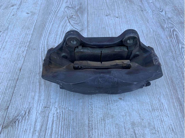 Супорт гальмівний, передній, лівий 84089034 GM