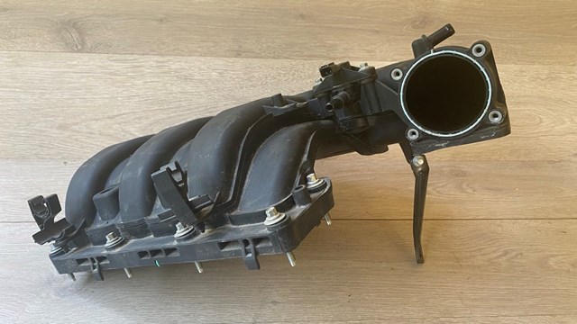 Колектор впускний FT4Z9424B FORD