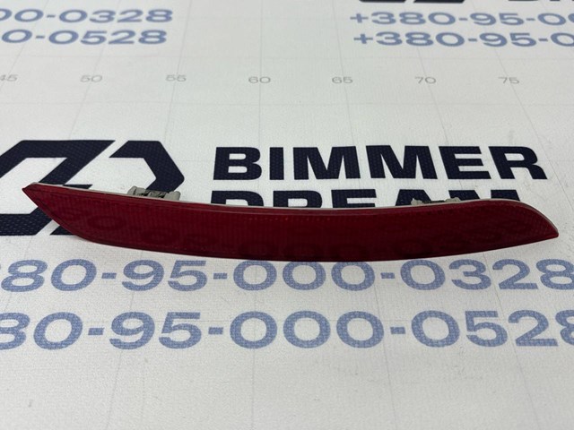 Катафот (відбивач) заднього бампера, лівий 63147203237 BMW