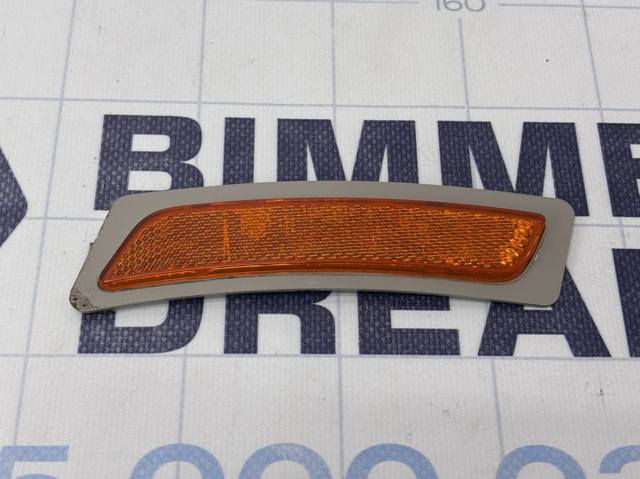 Катафот (відбивач) переднього бампера, правий 63147342094 BMW