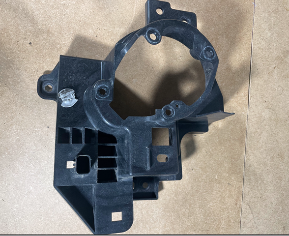 Кріплення протитуманки, лівої KB8B51694 MAZDA