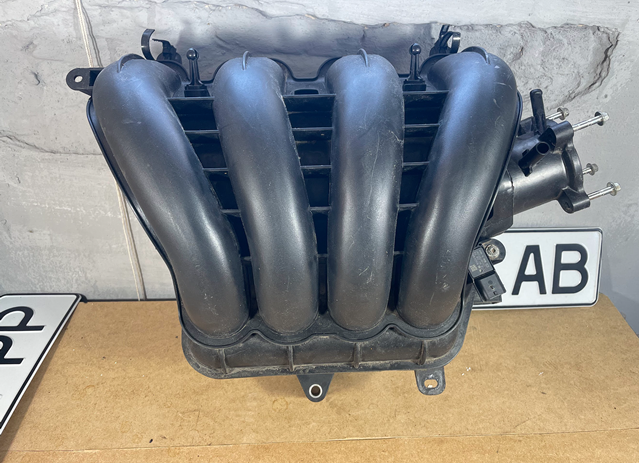 Колектор впускний PY0113100A MAZDA