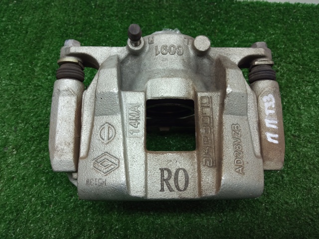 Супорт гальмівний, передній, правий 410016RR0A NISSAN