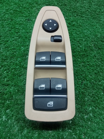 Кнопки переднього лівого склопід'ємника 61319208108 BMW