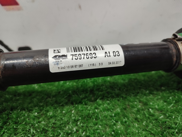 Піввісь передня ліва 7597693 BMW