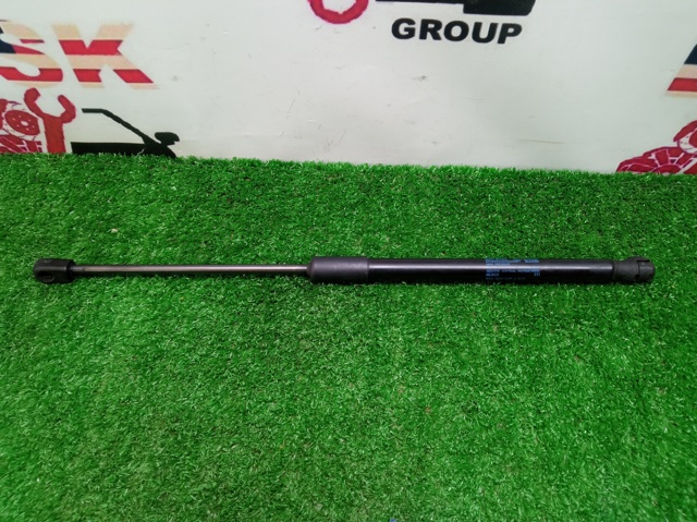 Амортизатор капота газовий 80A823359A VAG