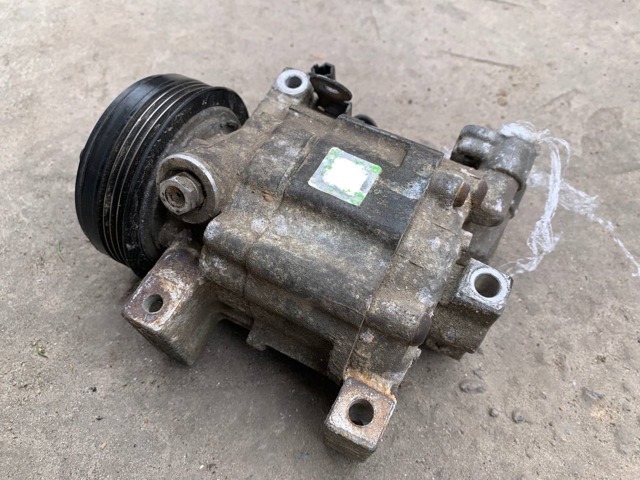Компресор кліматичної установки 73111FG001 SUBARU