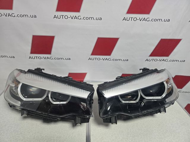 Фара основна ліва 63117214959 BMW
