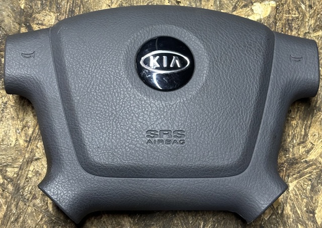 Подушка в кермі 569002F020GW HYUNDAI