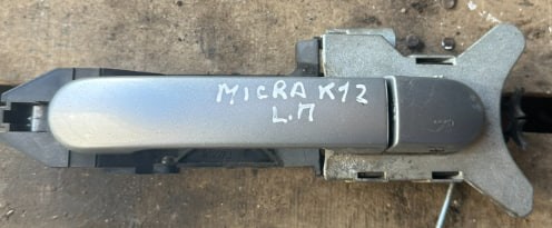 Ручка передніх дверей зовнішня, ліва 80644AX600 NISSAN