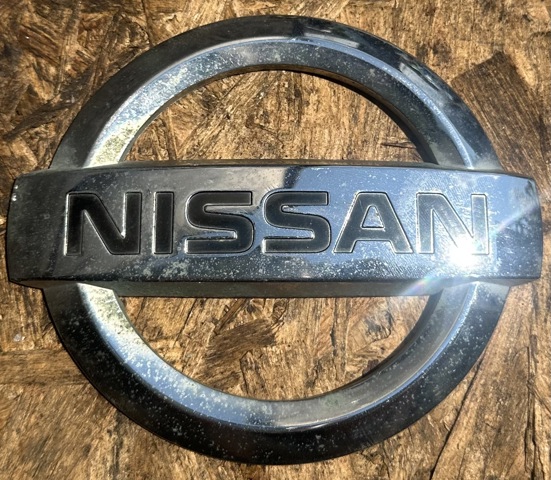 Емблема на кришку багажника, фірм.значок 90891EB300 NISSAN