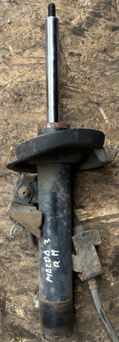 Амортизатор передньої підвіски BP4L34700 MAZDA