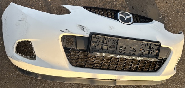 Кожух бампера переднього D65150031BAA MAZDA