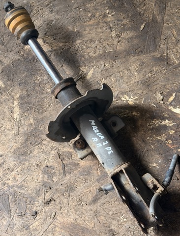 Стійка передня права DF7134700G MAZDA
