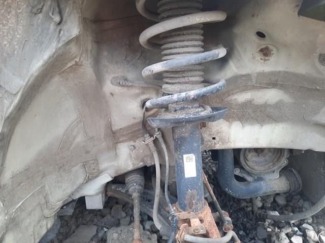 Амортизатор передньої підвіски 1T0413031HP VAG