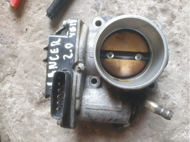Дросільна заслінка в зборі MN980320 MITSUBISHI