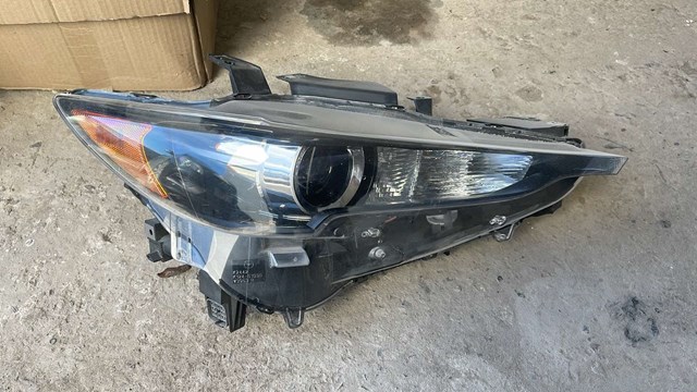 Фара передня права K12451030 MAZDA