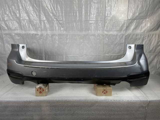 Кожух бампера заднього 57704SG012 SUBARU