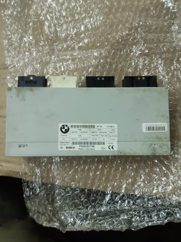 Блок управління відкриття кришки багажника 61357410612 BMW