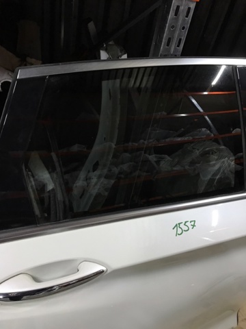 Скло заднє праве 823005NA2A NISSAN