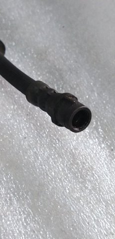 Гнучка гальмівна трубка задня 8K0611775J PORSCHE