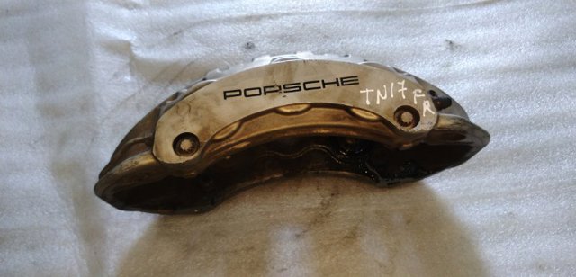 Супорт гальмівний, передній, правий 95B615124A PORSCHE