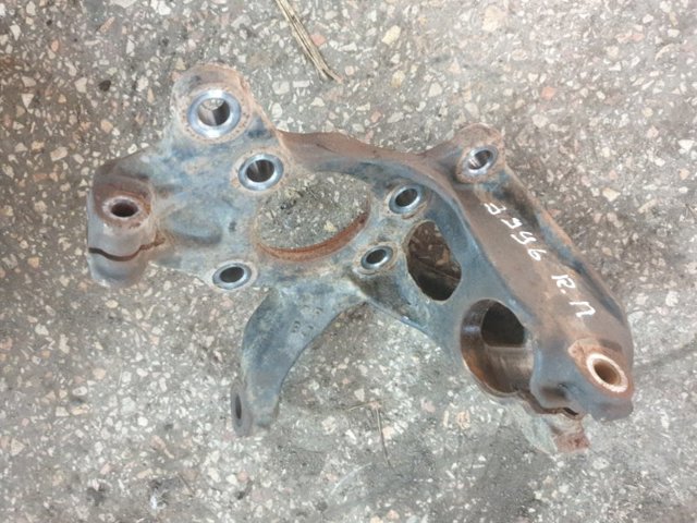 Цапфа поворотна права BCKE33021 MAZDA