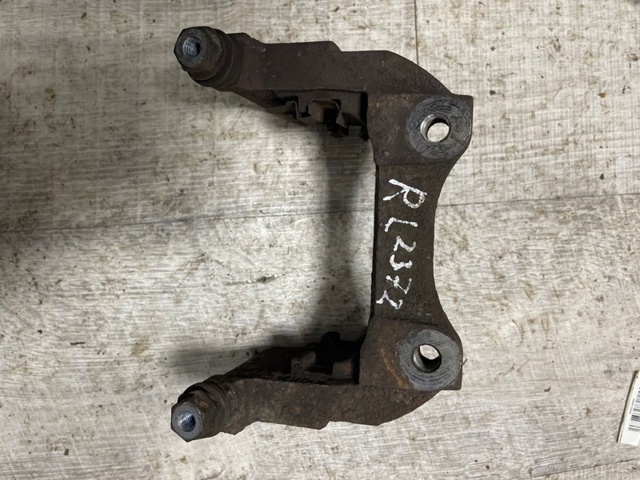 Скоба гальмівного заднього супорта LR036572 LAND ROVER