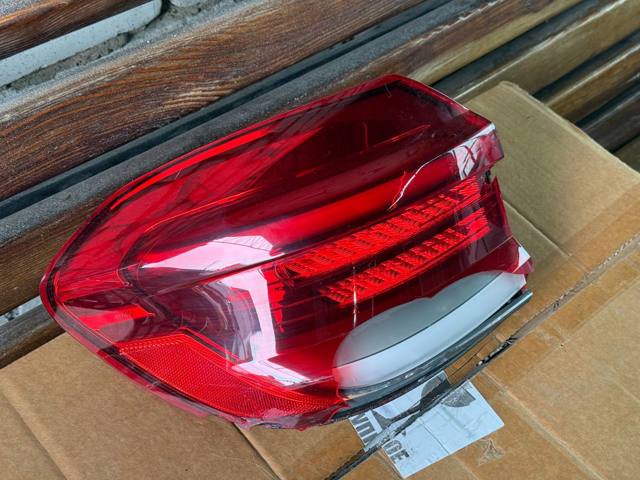 Задня ліва зовнішня фара 63219853365 BMW