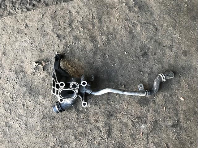 Водяний патрубок 059121071DE VAG