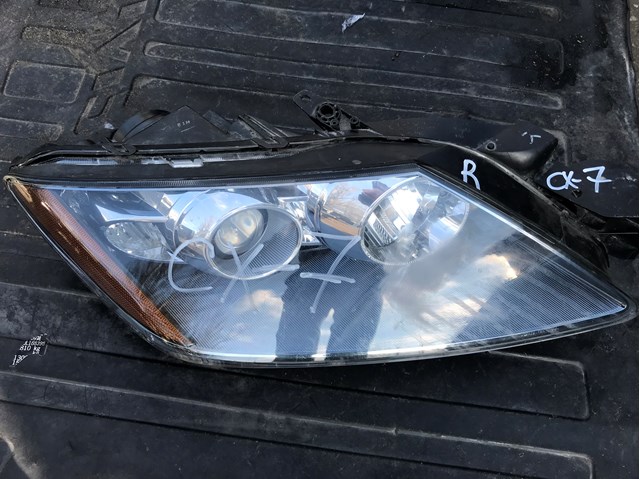 Фара комбінована, передня EH1051030 MAZDA