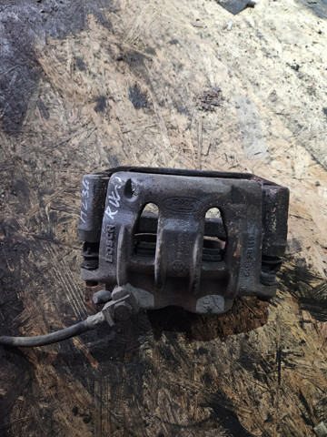 Супорт гальмівний, передній, правий 1521149 FORD