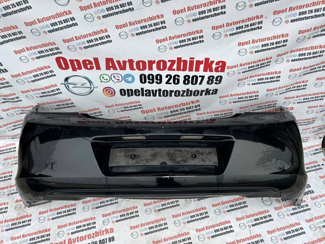 Кожух бампера заднього 13238744 GM