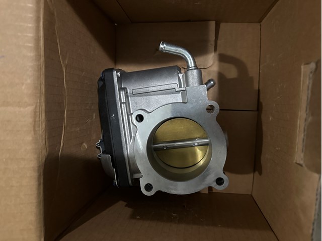 Дросільна заслінка в зборі 1450A101 MITSUBISHI